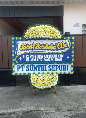 Papan Bunga Duka di Luas