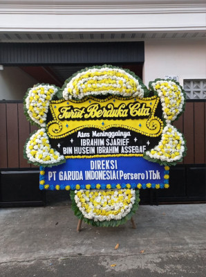 Papan Bunga Duka di Luas