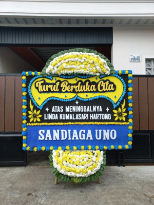 Papan Bunga Duka di Luas