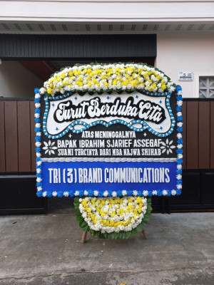 Papan Bunga Duka di Luas